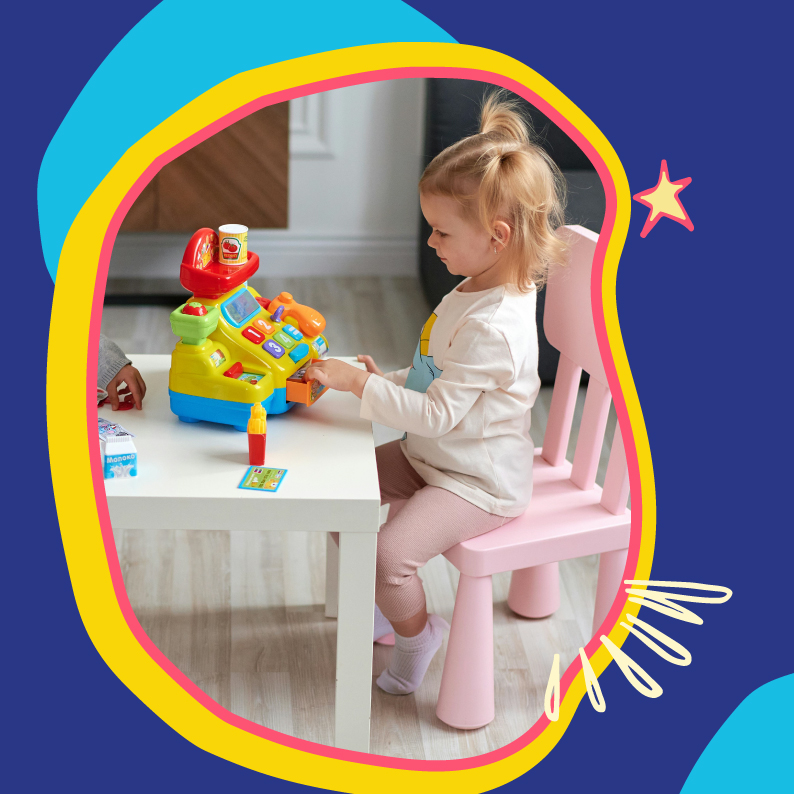 little girl playing with toys